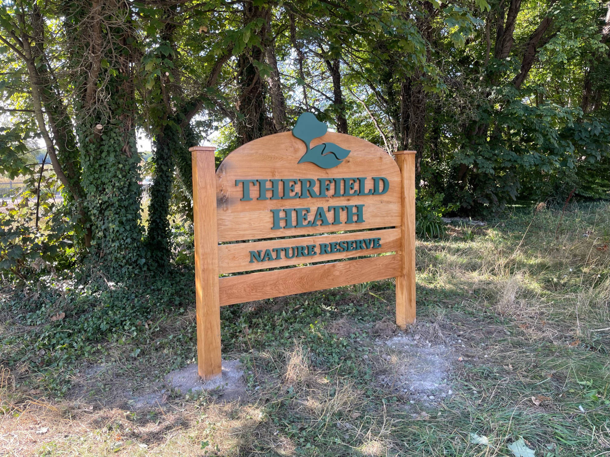wooden post sign